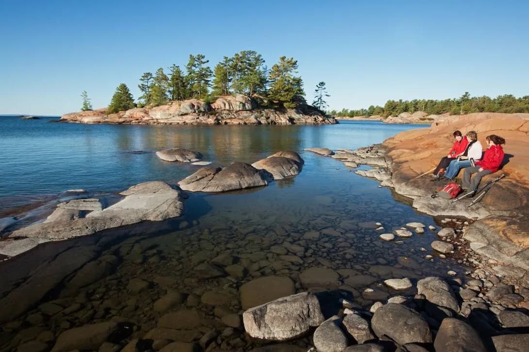 A small pine island off the pink granite shore of Georgian Bay at Killarney